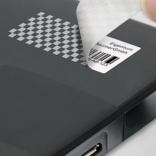 Etichete de protecție și securitate aplicată pe un laptop